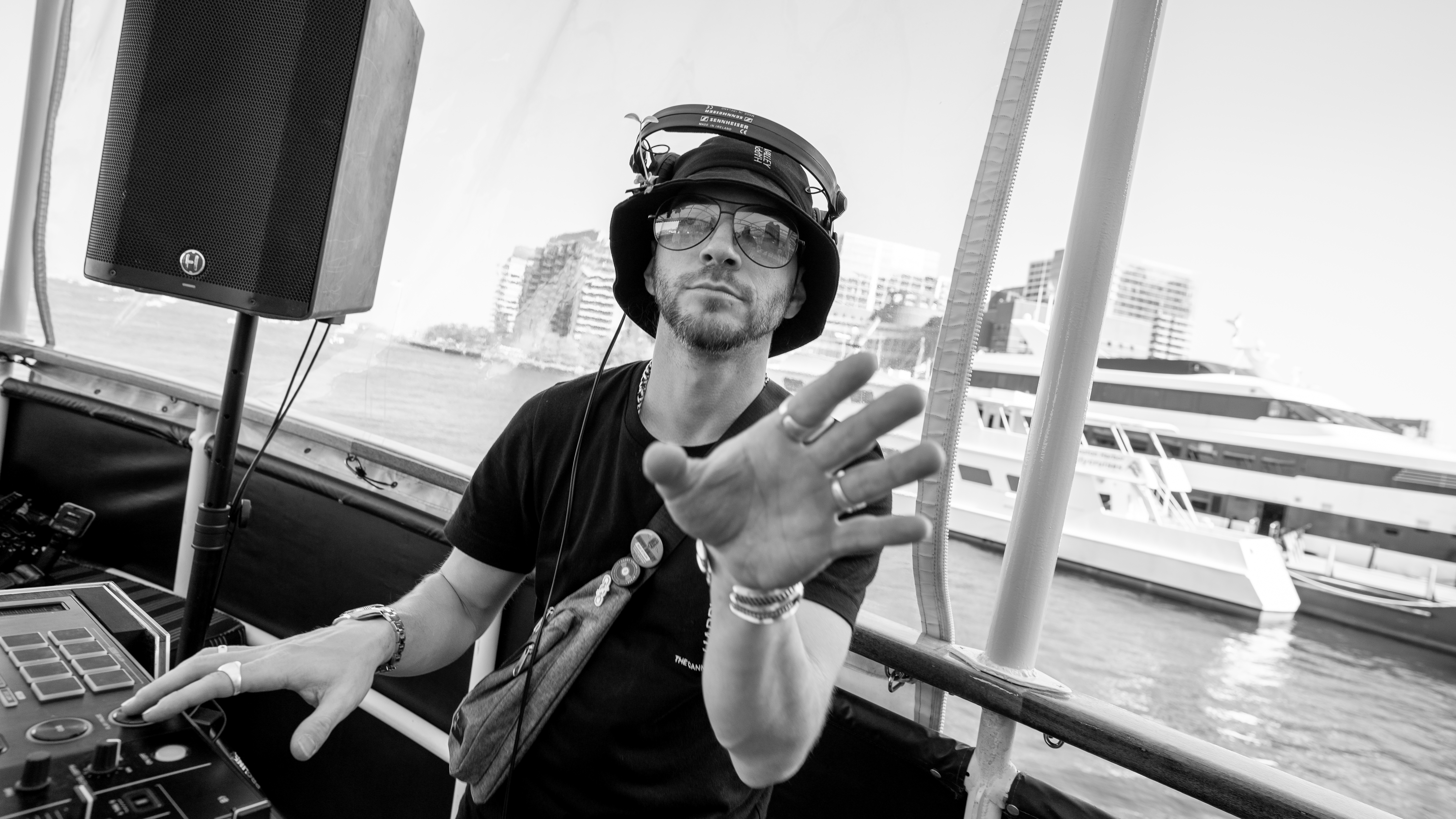 Shane Gardner DJing a yacht party