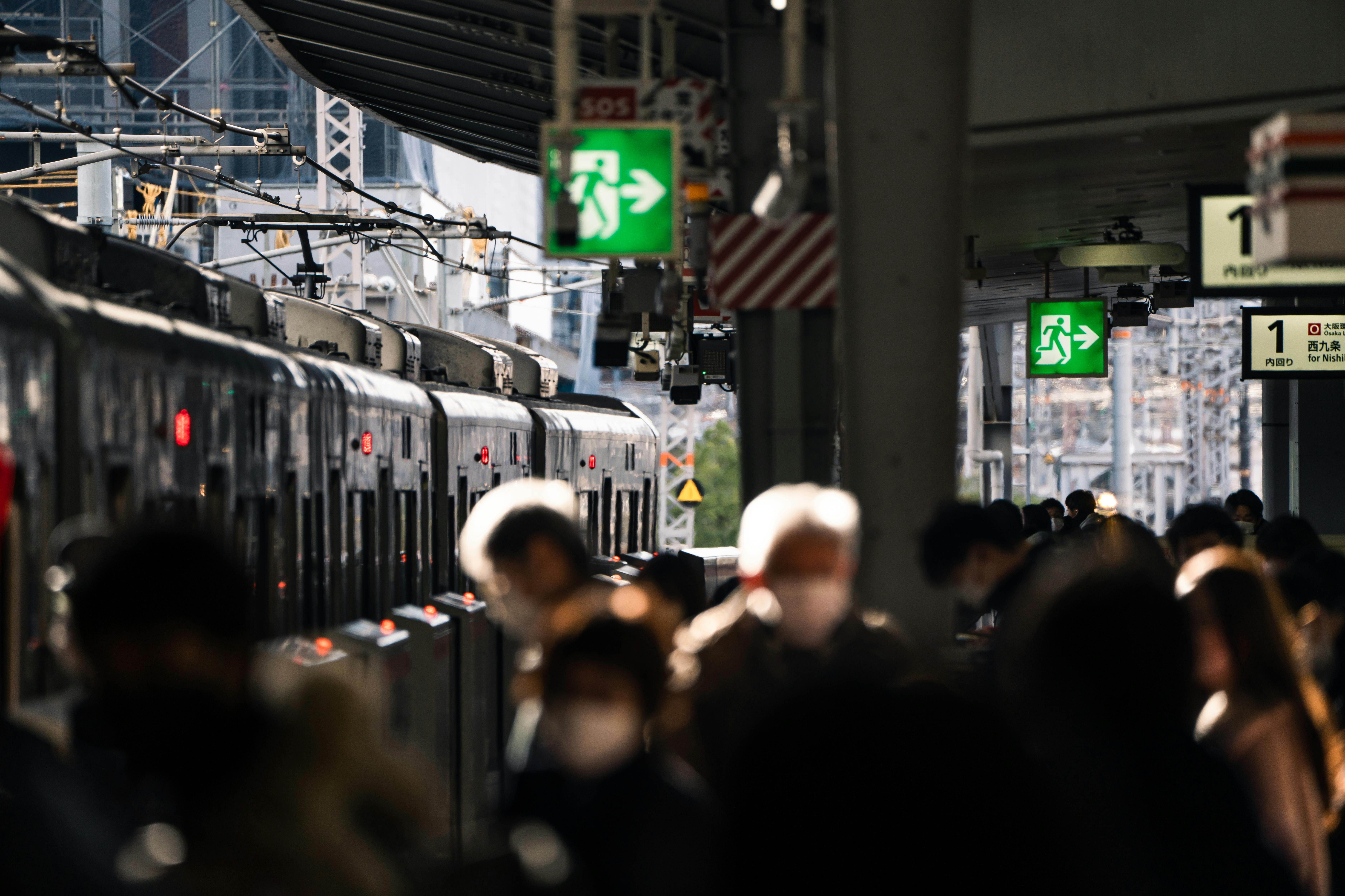 People getting ready to hop on a train in Japan // Classic Entourage Mag